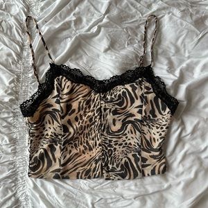 Princess Polly Cheetah print corset with lace trim 
Super cute in a US6